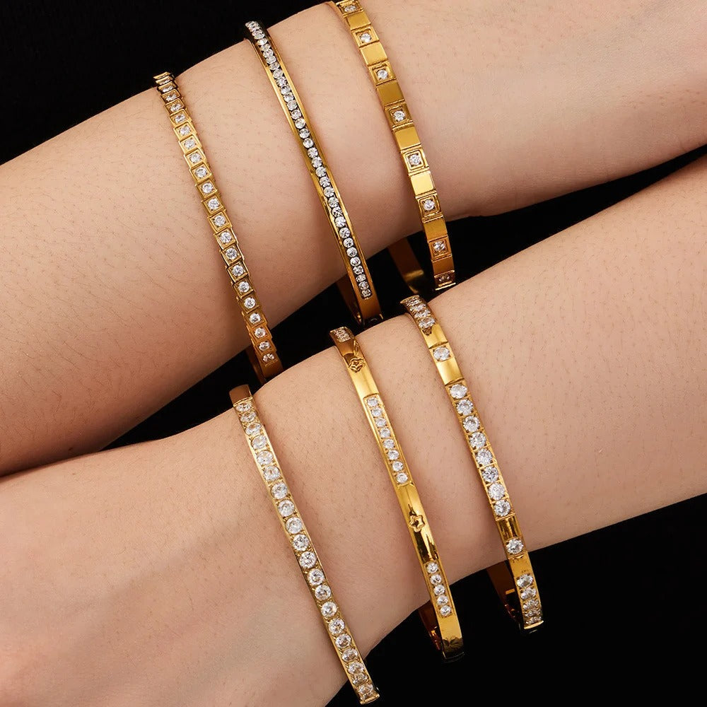 Bangles stacked on two wrists