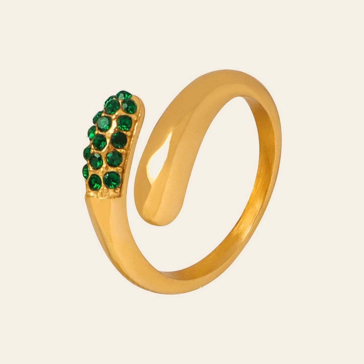 The Dewdrop Ring with green stones
