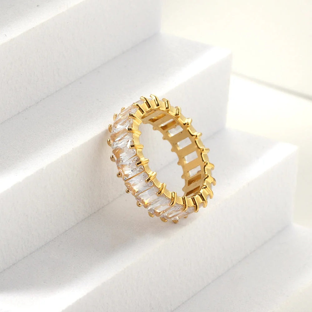 The Forever Ring styled on white steps