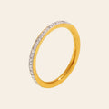 The Glimmer Ring in gold with a crystal edge