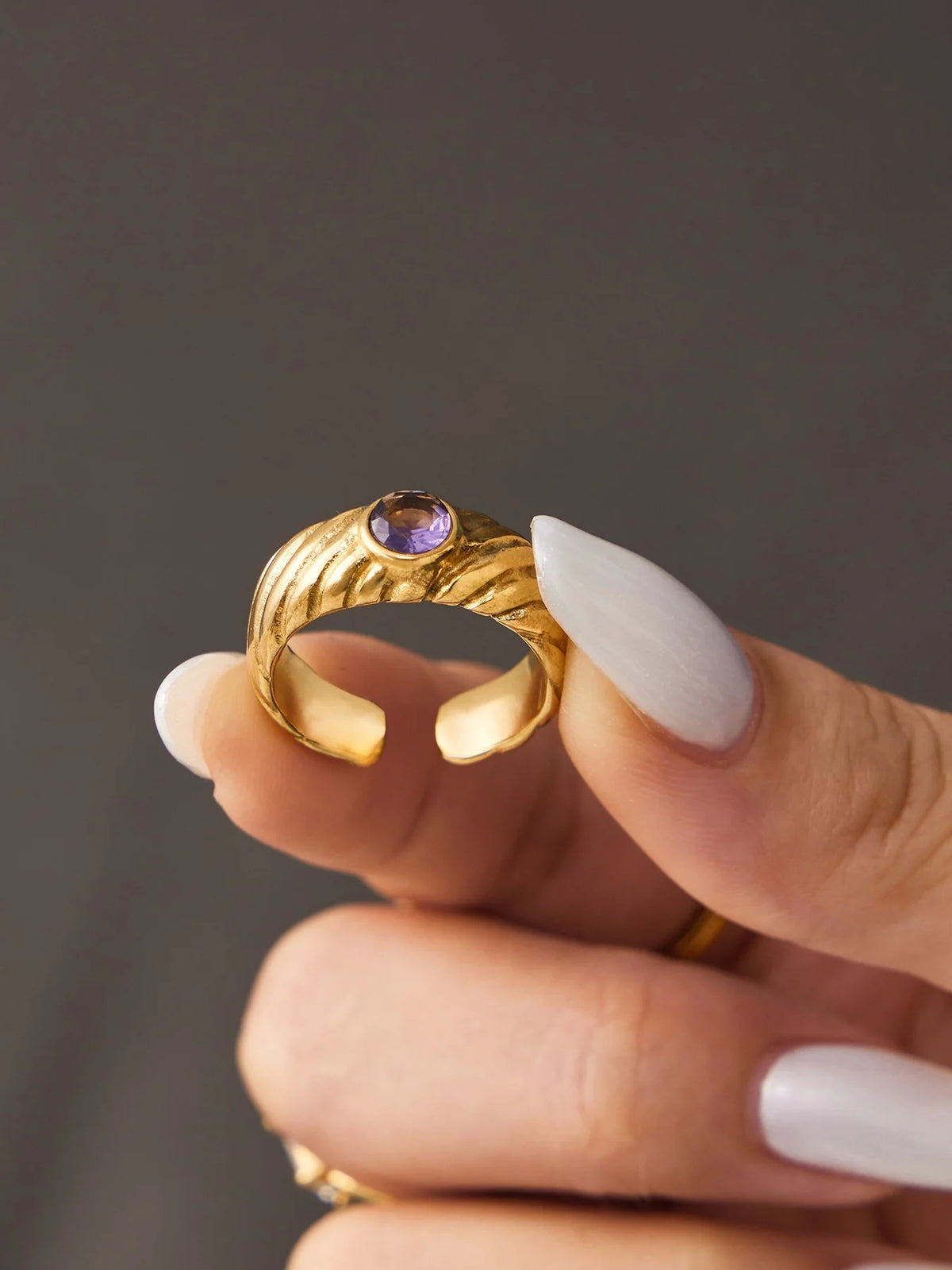 The Lilac Ring held in hand