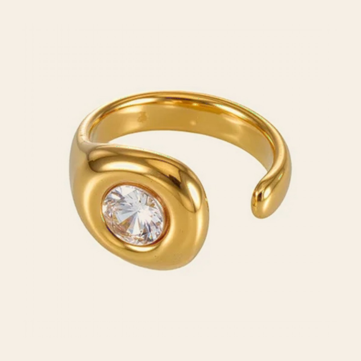 The Orbit Ring, a gold wrap ring with a single stone