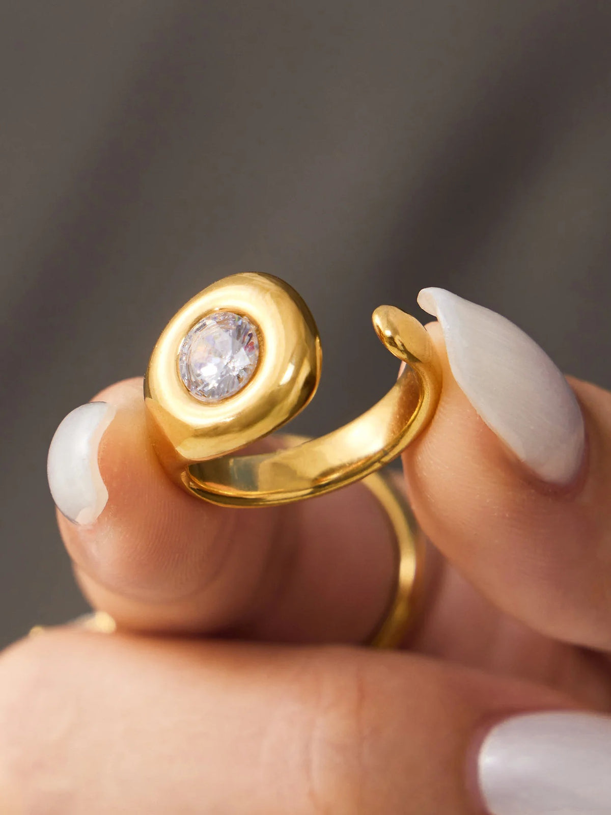The Orbit Ring held in hand
