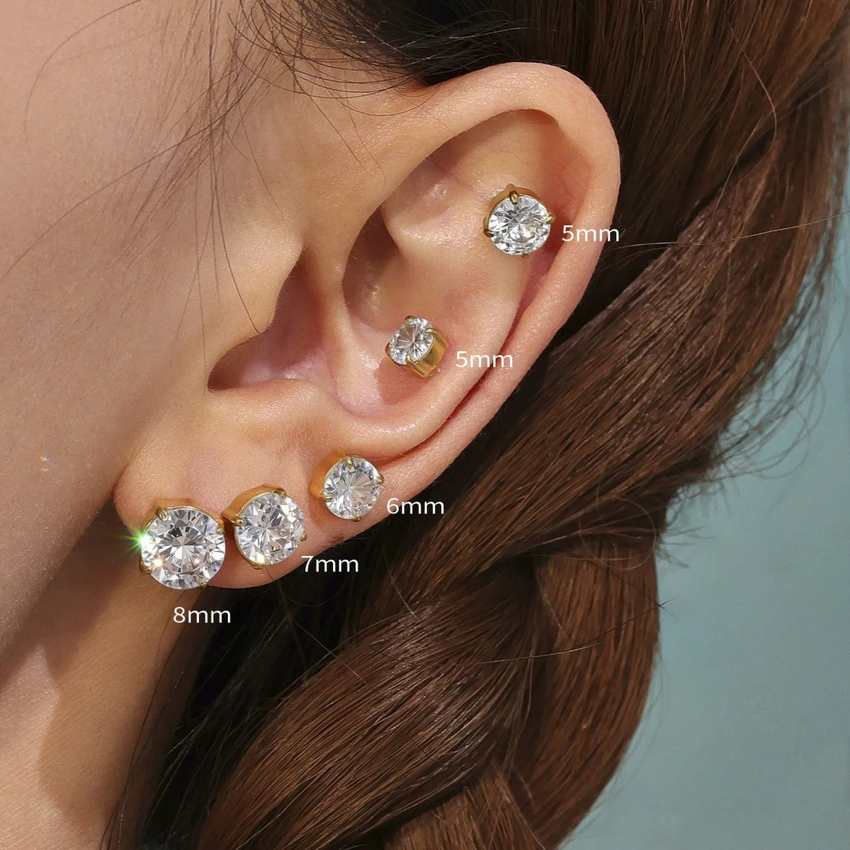 Solitaire Studs size guide on the ear, 5 to 8 mm