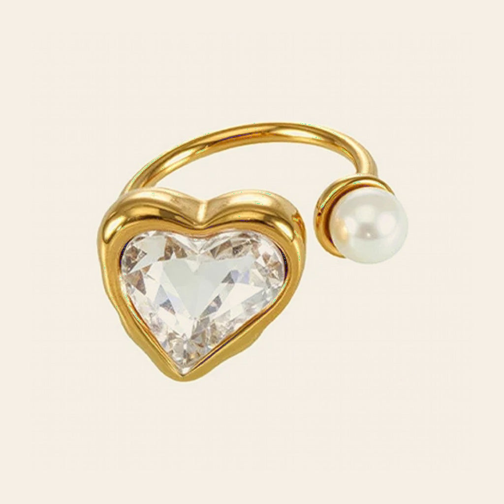 The Sweetheart Ring, a gold heart crystal ring with a pearl