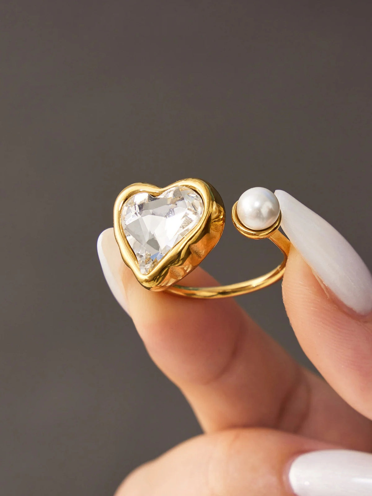 The Sweetheart Ring held in hand