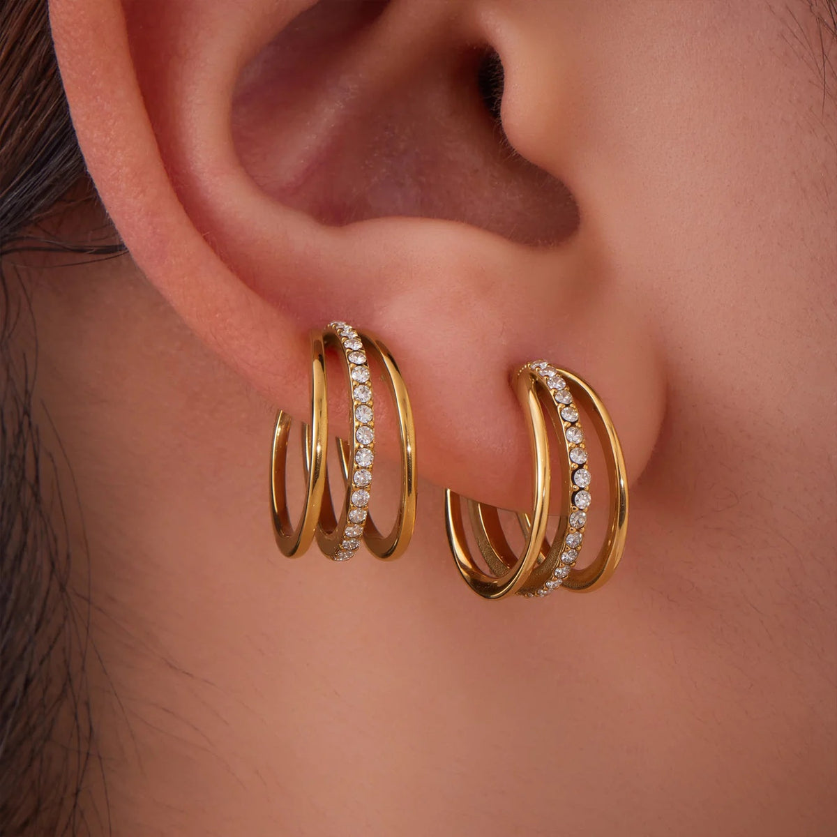 Gold Tier Ear Cuffs on the ear