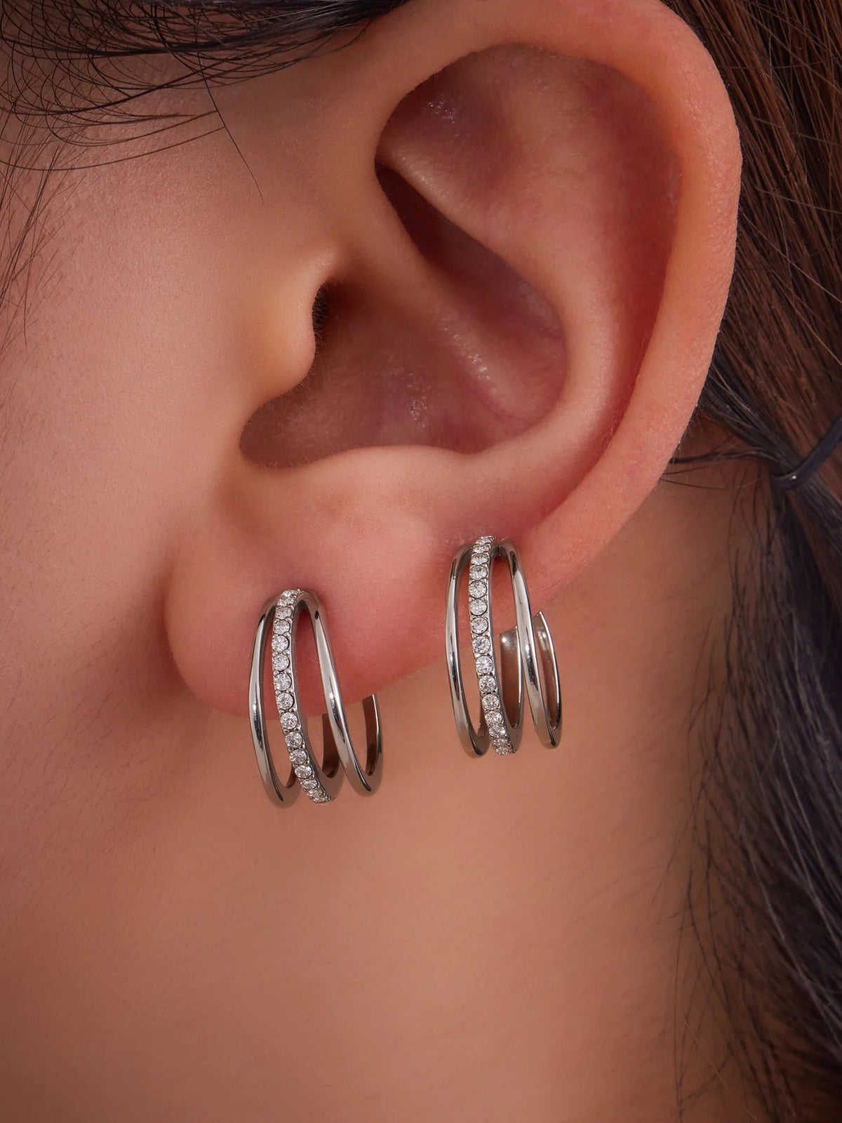 Silver Tier Ear Cuffs on the ear