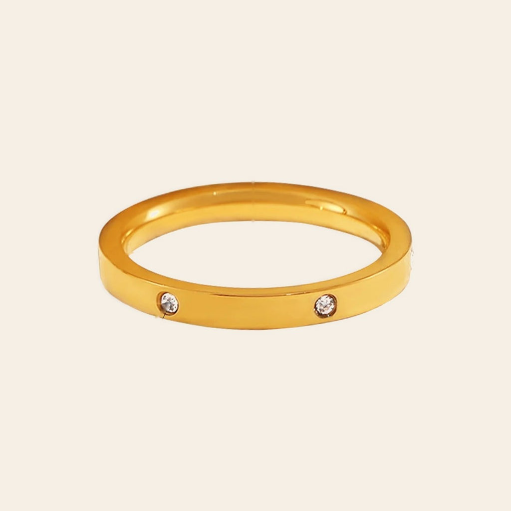 The Twinkle Ring in gold with spaced stones
