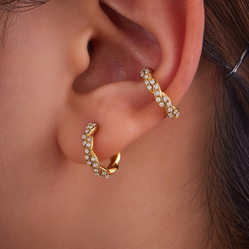 Gold Twist Ear Cuffs on the ear
